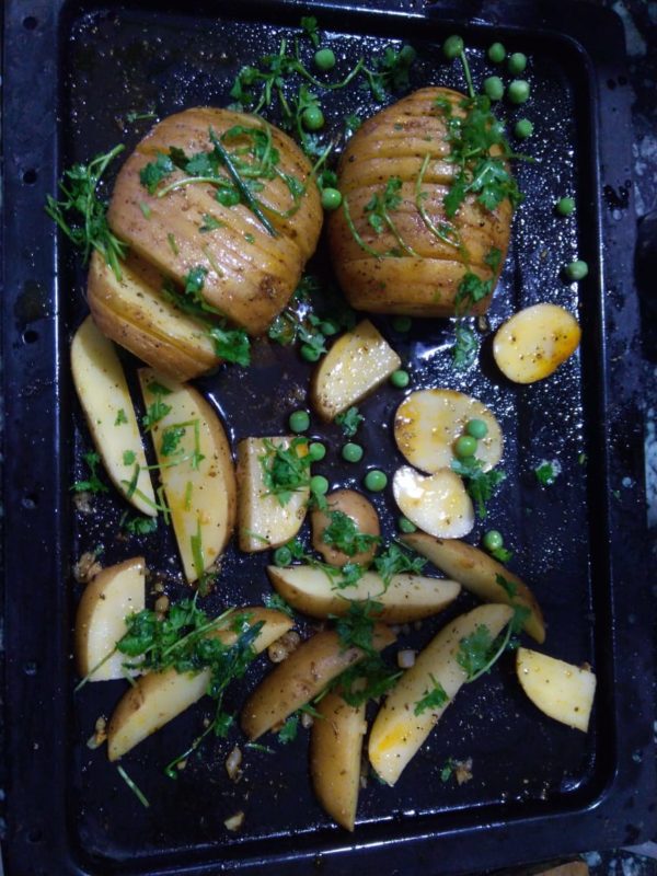 Season them with salt and pepper and add chopped coriander.
Now put the potatoes in the oven for 30-35 min at 200  deg C. 